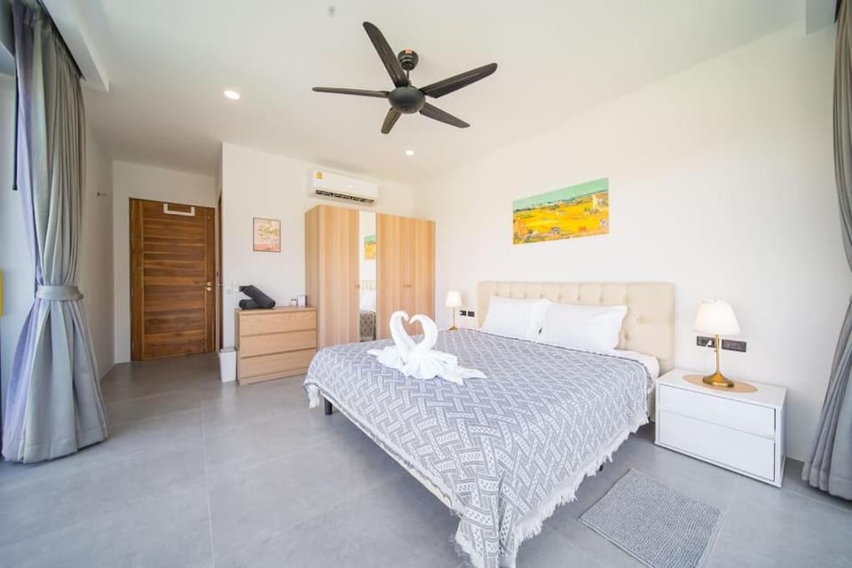 Photo of the whole room, Bedroom, fireplace, towels, wardrobe, air conditioner