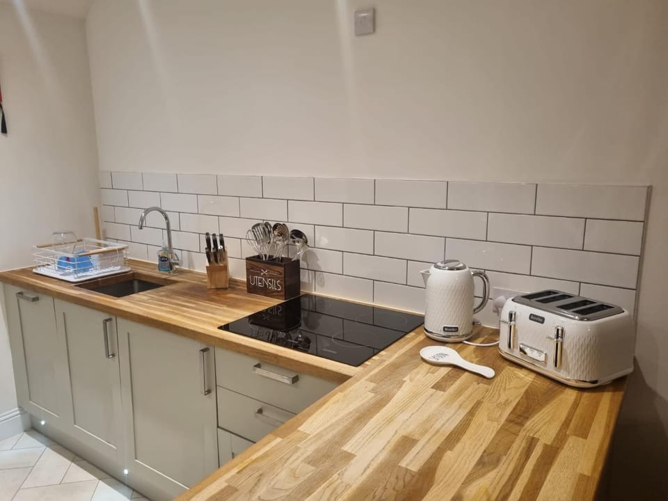 Kitchen or kitchenette, stove