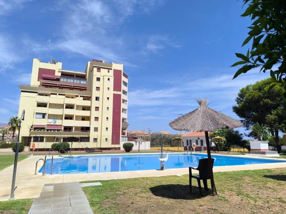 Property building, Living room, Swimming pool