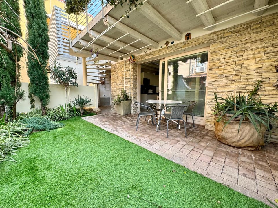 Property building, Patio, Garden, Dining area, Garden view