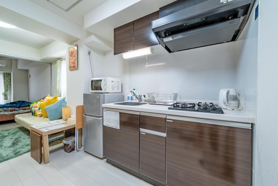 Kitchen or kitchenette, Seating area, minibar, stove