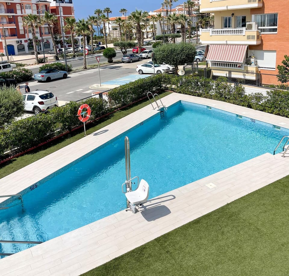 Property building, Living room, Swimming pool