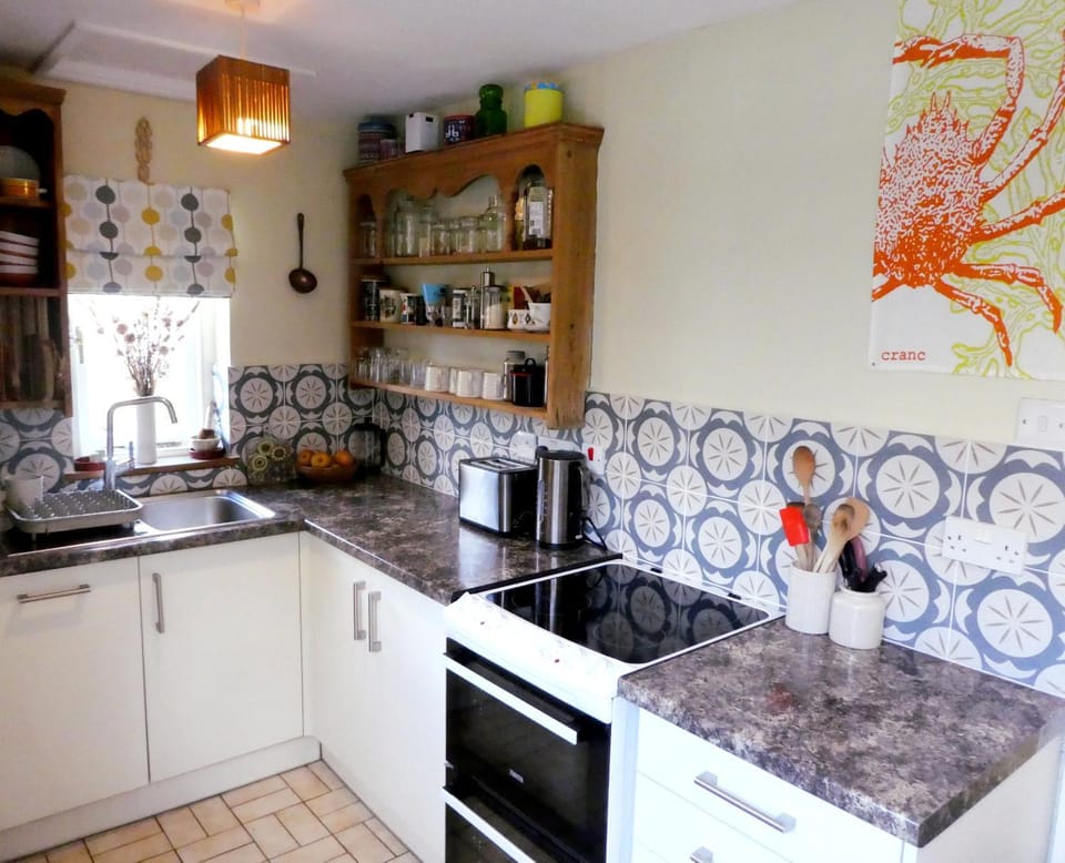 Kitchen or kitchenette, oven, stove, toaster