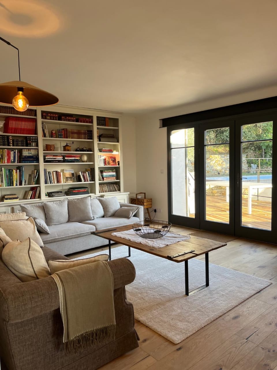 Library, Living room, Seating area, Garden view, Pool view