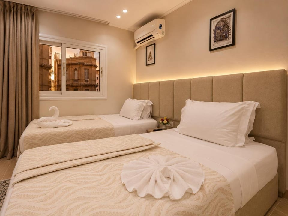 Bed, Photo of the whole room, Bedroom, towels, air conditioner