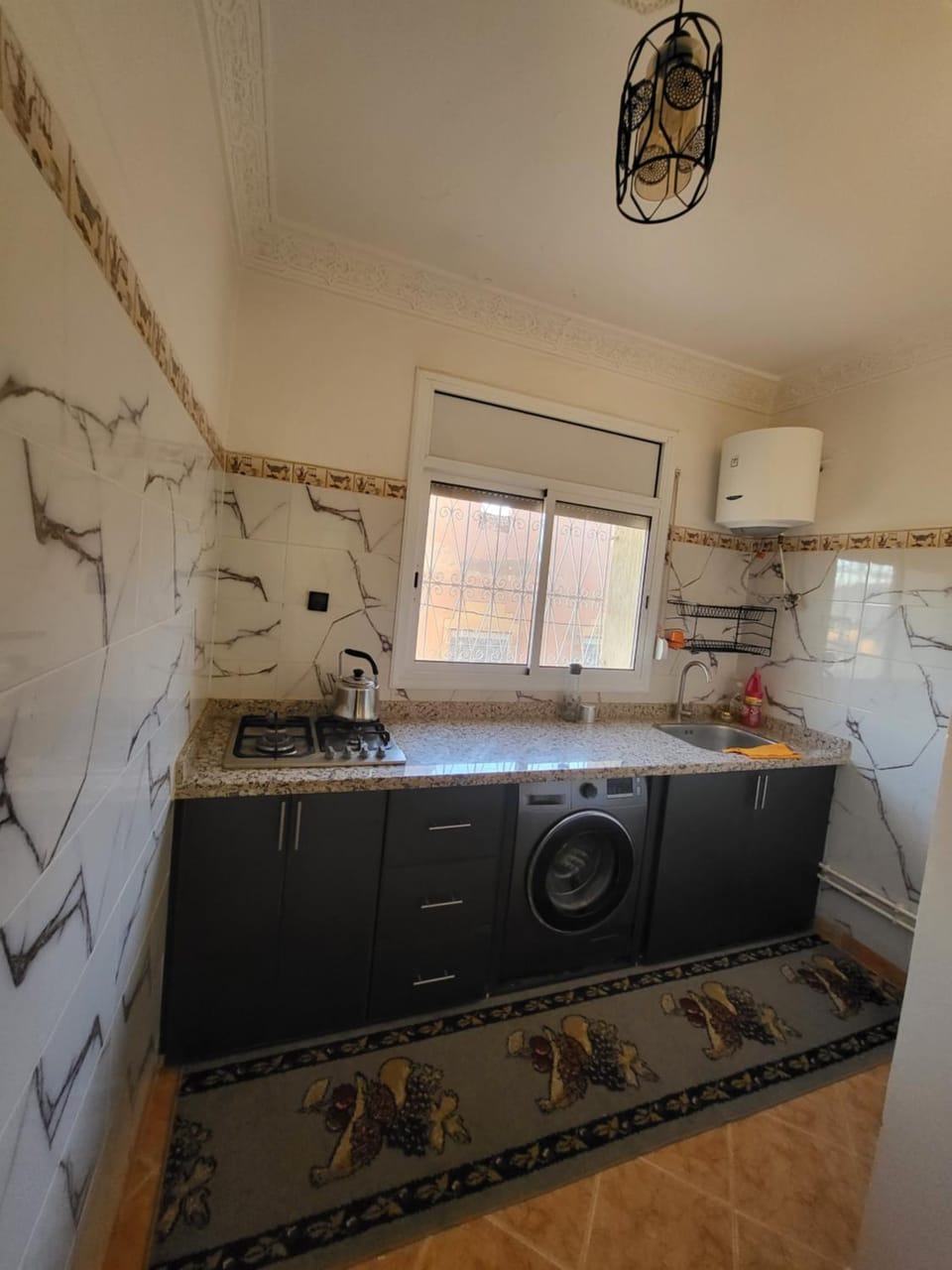 Coffee/tea facilities, Kitchen or kitchenette, stove, washing machine