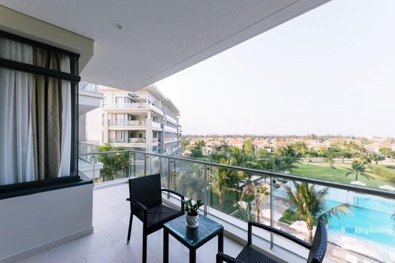 Property building, Patio, View (from property/room), Balcony/Terrace, Living room, Seating area, Pool view, Swimming pool, sunbed