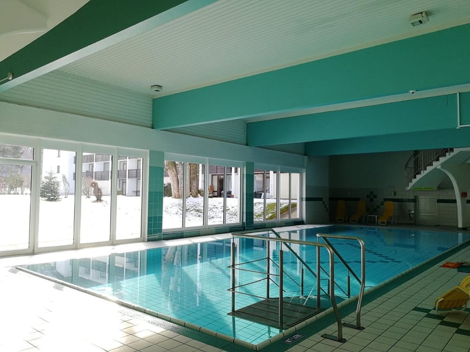 Property building, Living room, Swimming pool