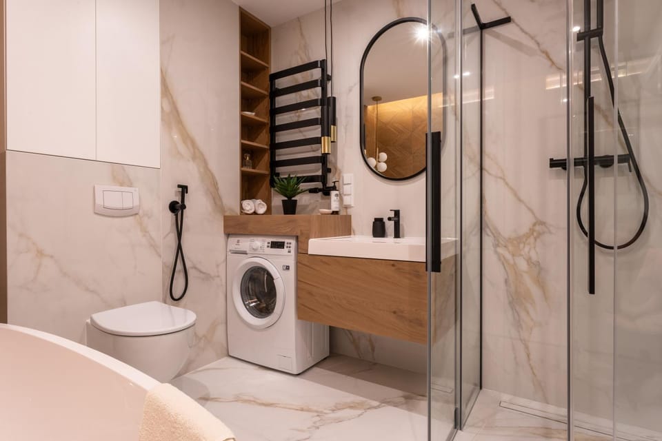 Shower, Toilet, Bathroom, bidet, towels, washing machine