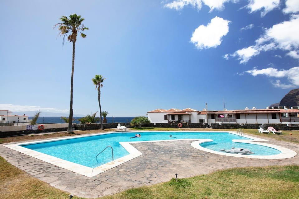 Property building, Living room, Swimming pool