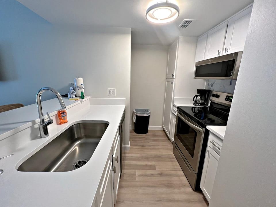 Kitchen or kitchenette, dishwasher, oven, stove, kitchen