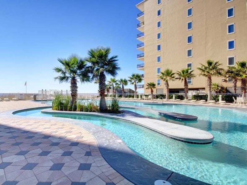 Property building, Day, Pool view, Swimming pool, sunbed
