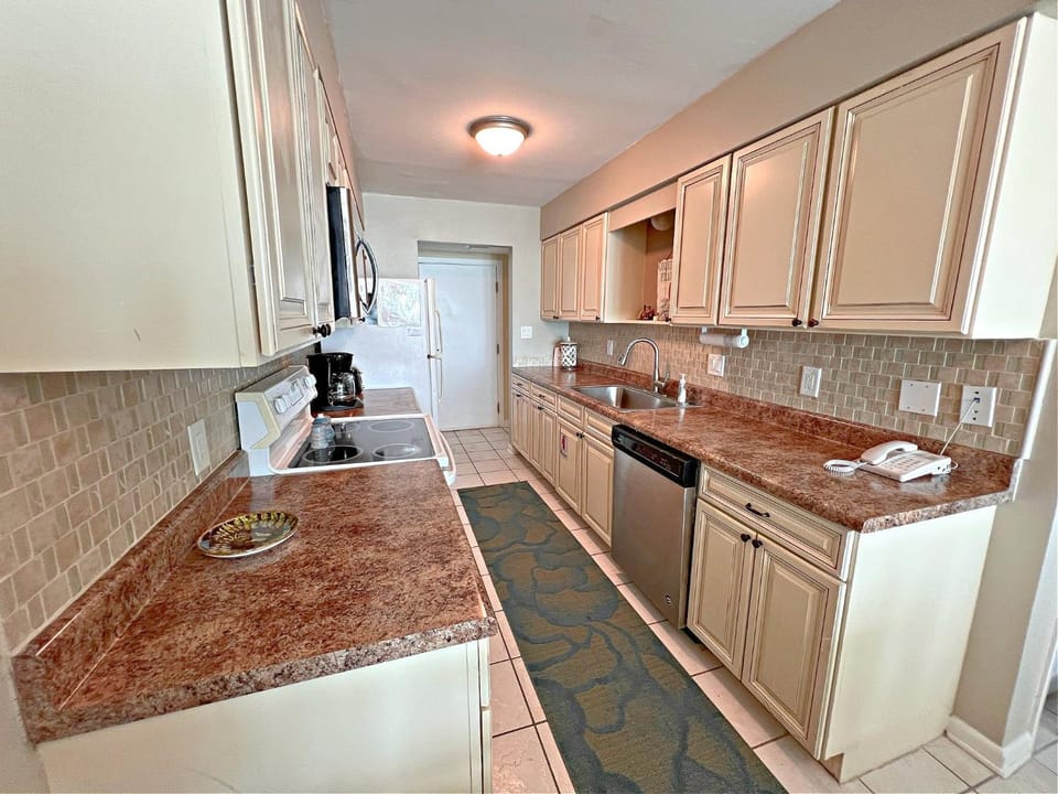 Kitchen or kitchenette, dishwasher, oven, stove, kitchen