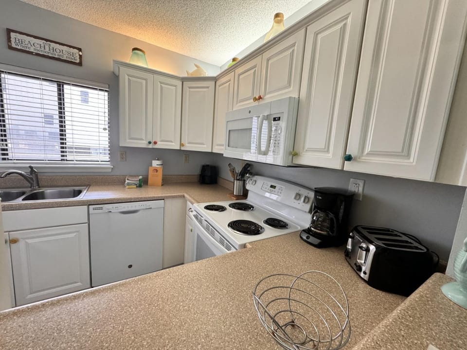 Kitchen or kitchenette, stove, kitchen