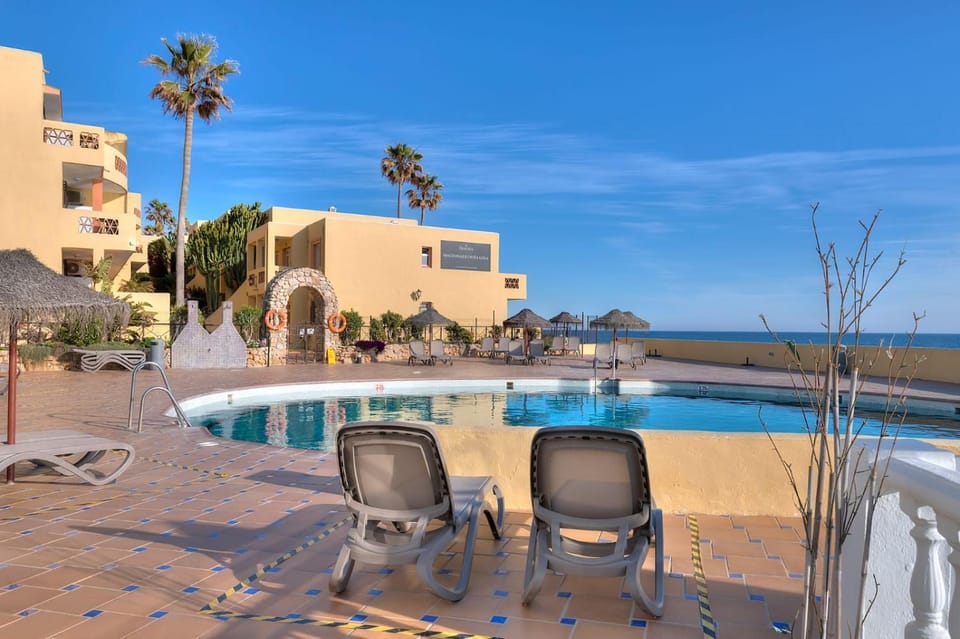 View (from property/room), Pool view, Sea view, Swimming pool, sunbed