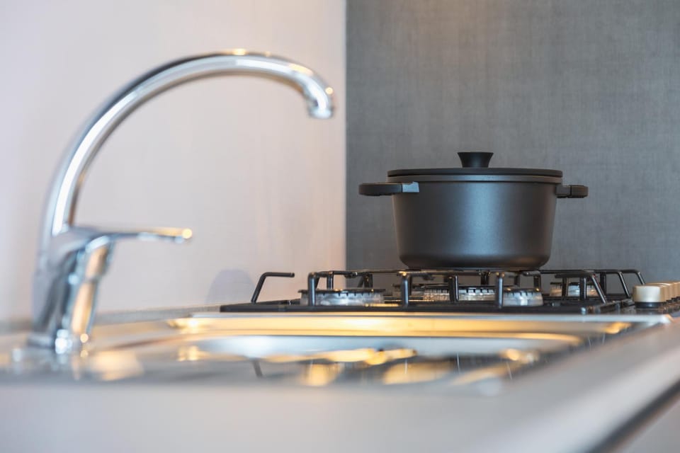 Kitchen or kitchenette, stove