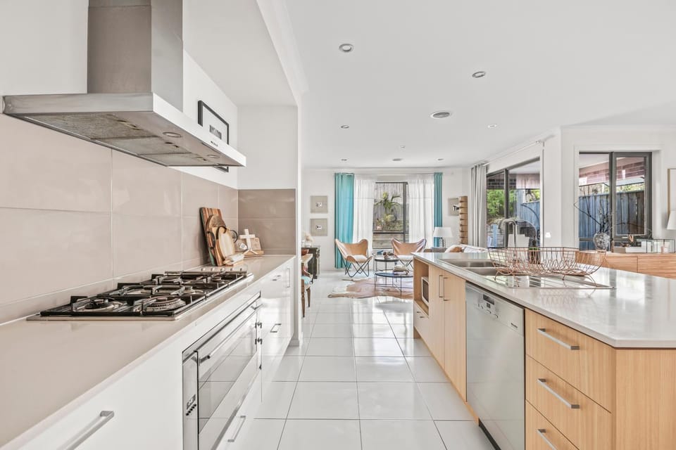 Kitchen or kitchenette, dishwasher, oven, stove