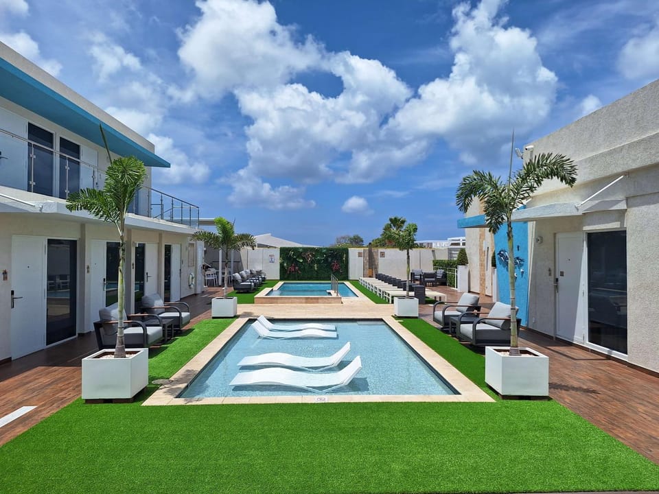 Property building, Pool view, Swimming pool, sunbed