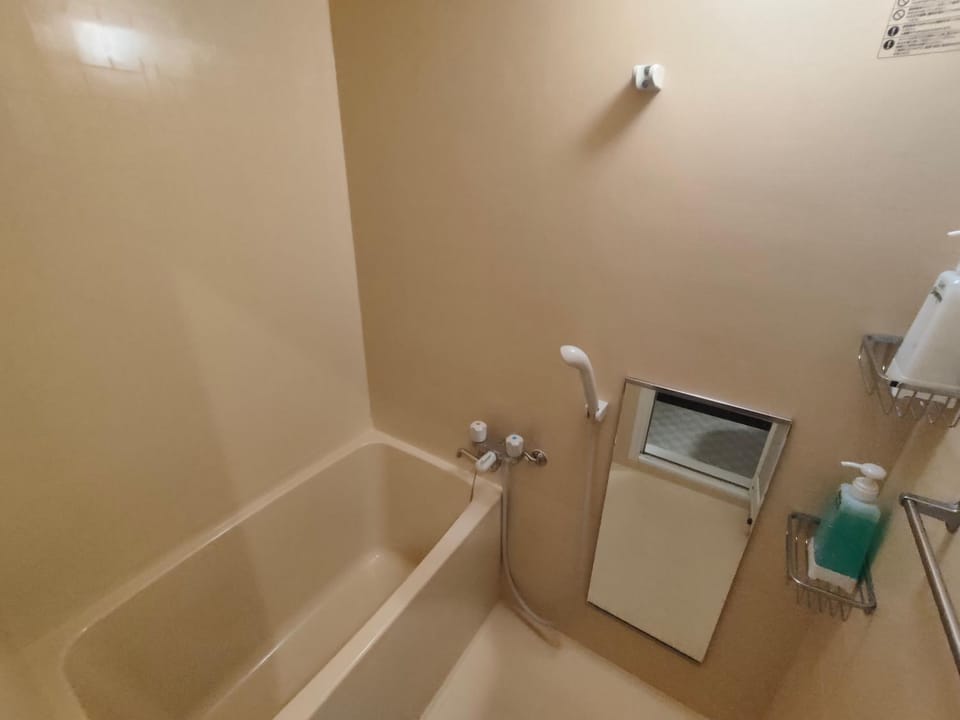 Apartments in the Namba area with airport bus and railway access Apartment in Osaka