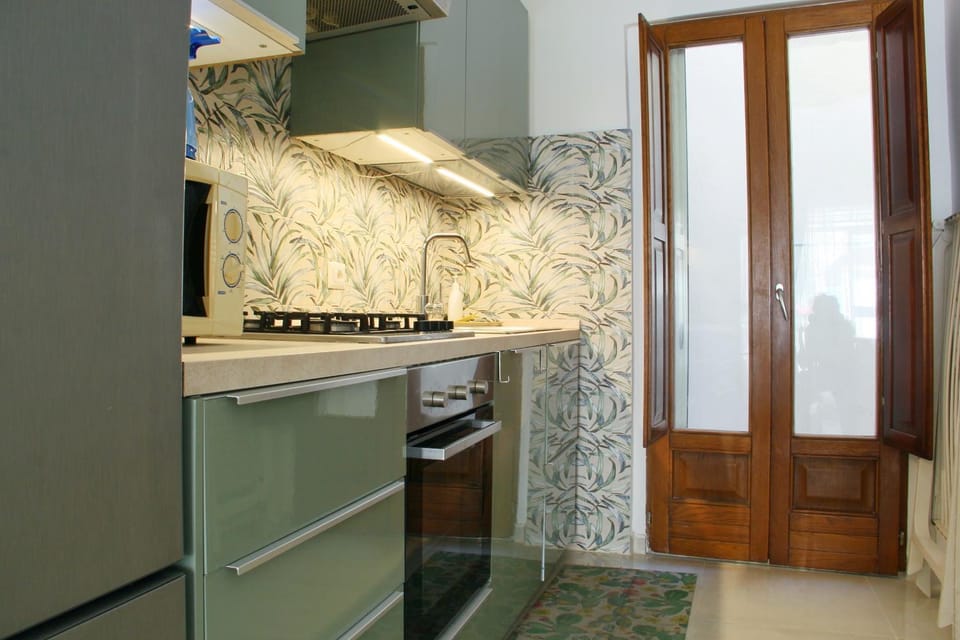 Kitchen or kitchenette, oven, stove