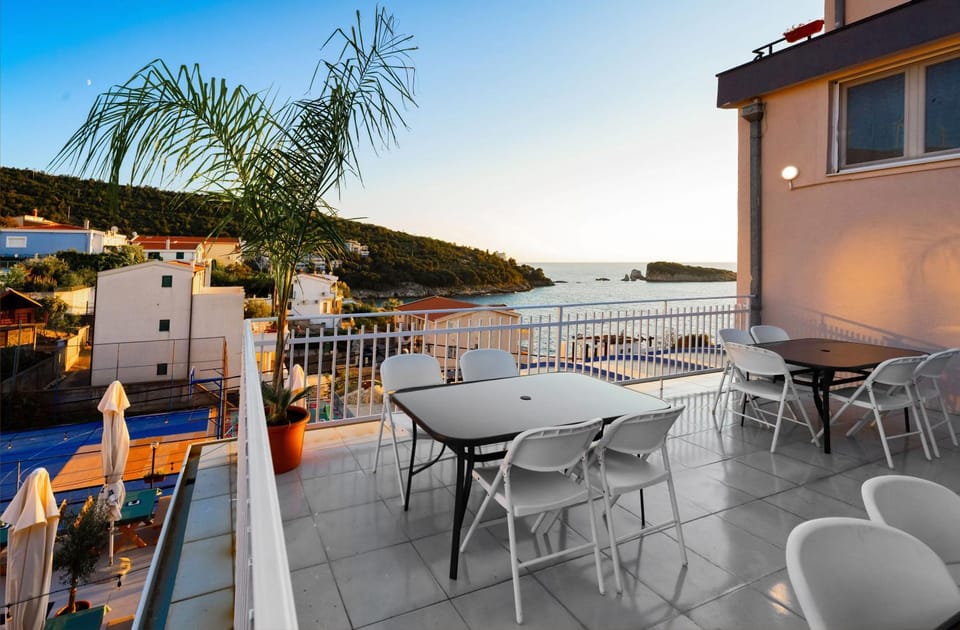 Property building, Patio, Day, View (from property/room), Balcony/Terrace, Seating area, Mountain view, Sea view