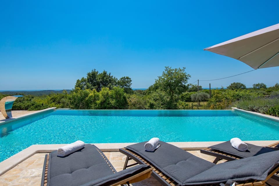 Patio, Day, Natural landscape, Pool view, Sea view, Swimming pool, sunbed