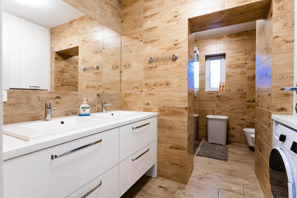 Shower, Toilet, Bathroom, towels, washing machine, dryer
