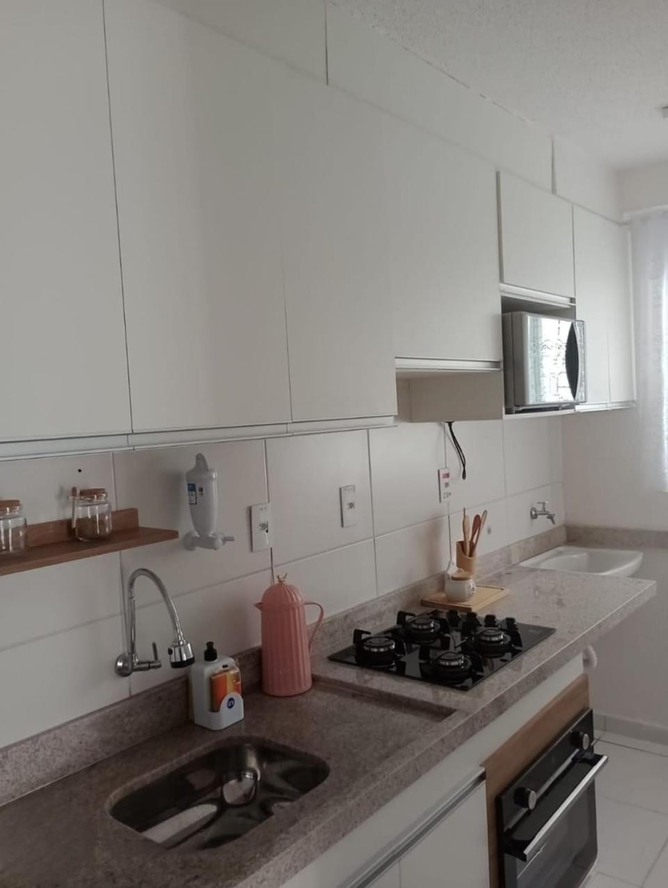 Kitchen or kitchenette, microwave, oven, stove