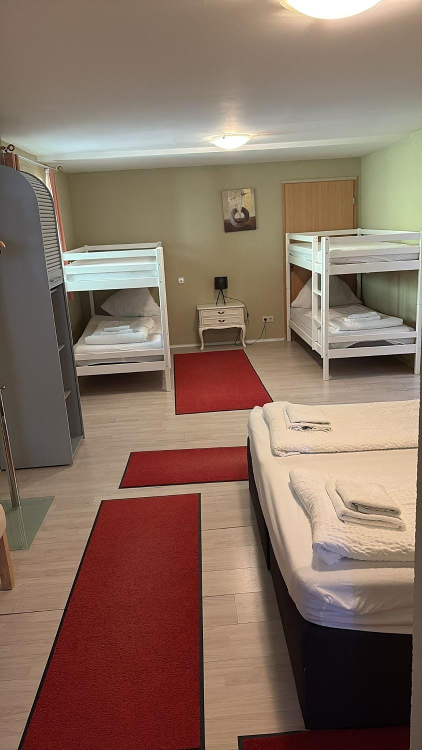 Bed, Photo of the whole room, Bedroom, bunk bed, towels, wardrobe