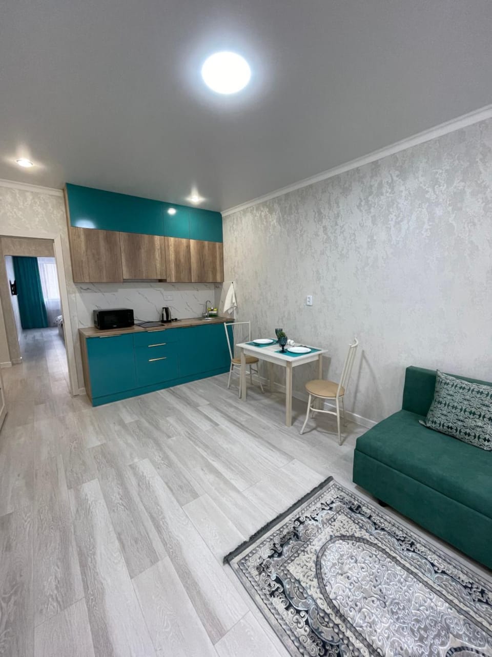 Kitchen or kitchenette, Living room, Seating area, Dining area