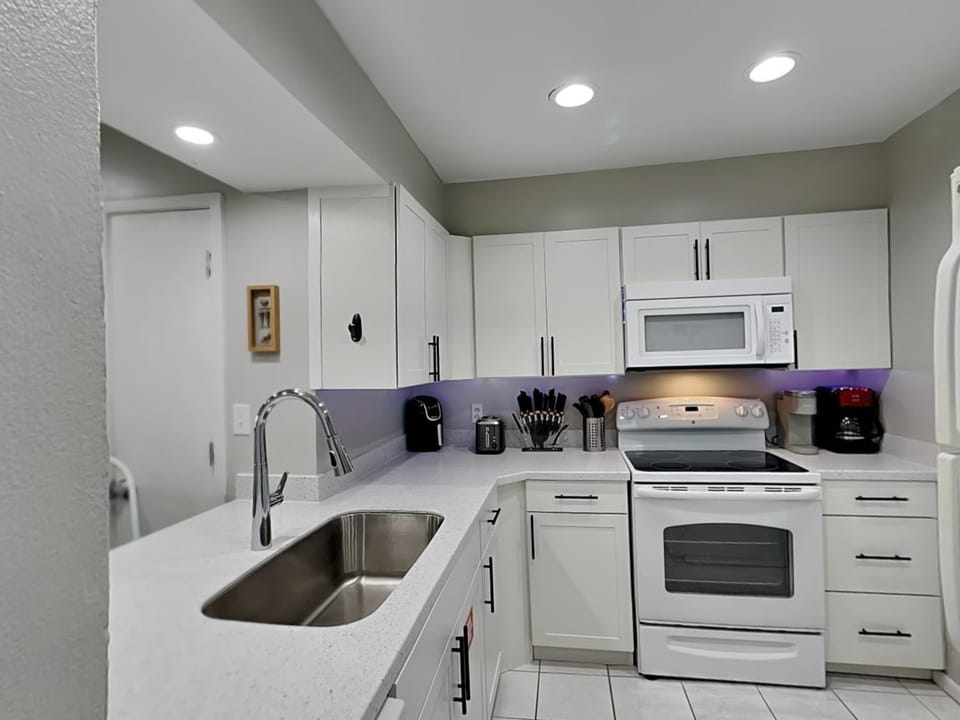 Kitchen or kitchenette, microwave, oven, stove, kitchen