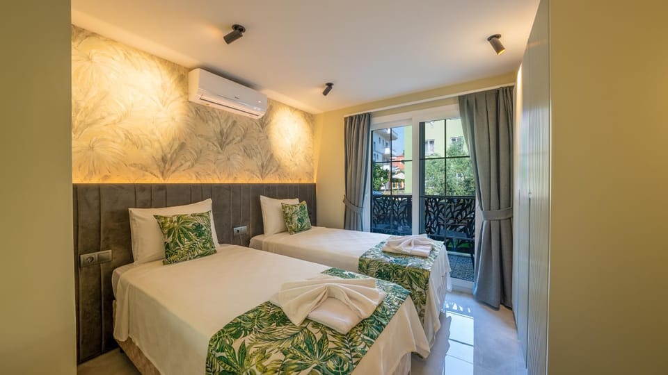 Bed, Photo of the whole room, Bedroom, towels, air conditioner