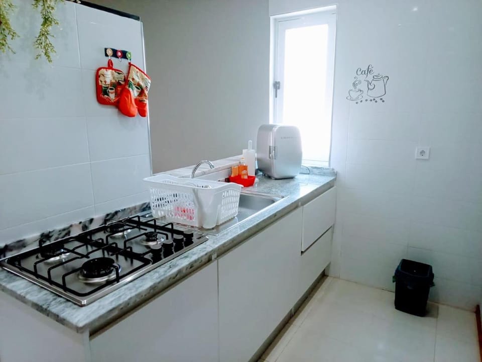 Kitchen or kitchenette, stove