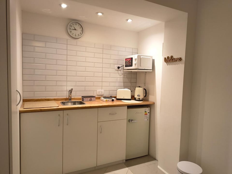 Kitchen or kitchenette, stove, toaster