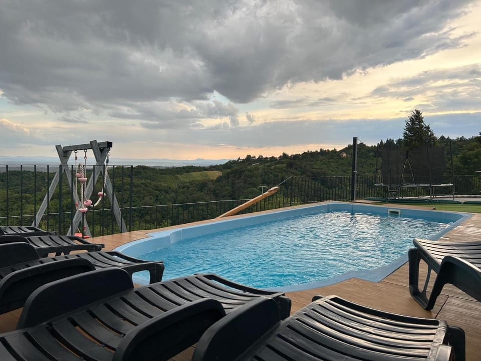 Patio, Day, Natural landscape, Pool view, Swimming pool, sunbed