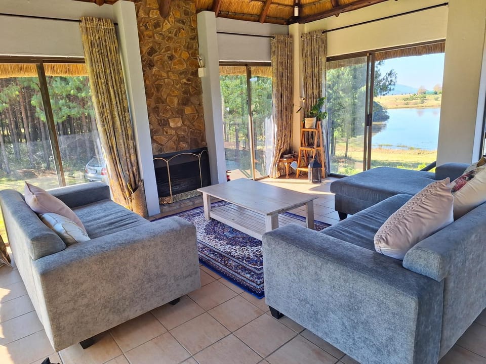 View (from property/room), Living room, Seating area, Dining area