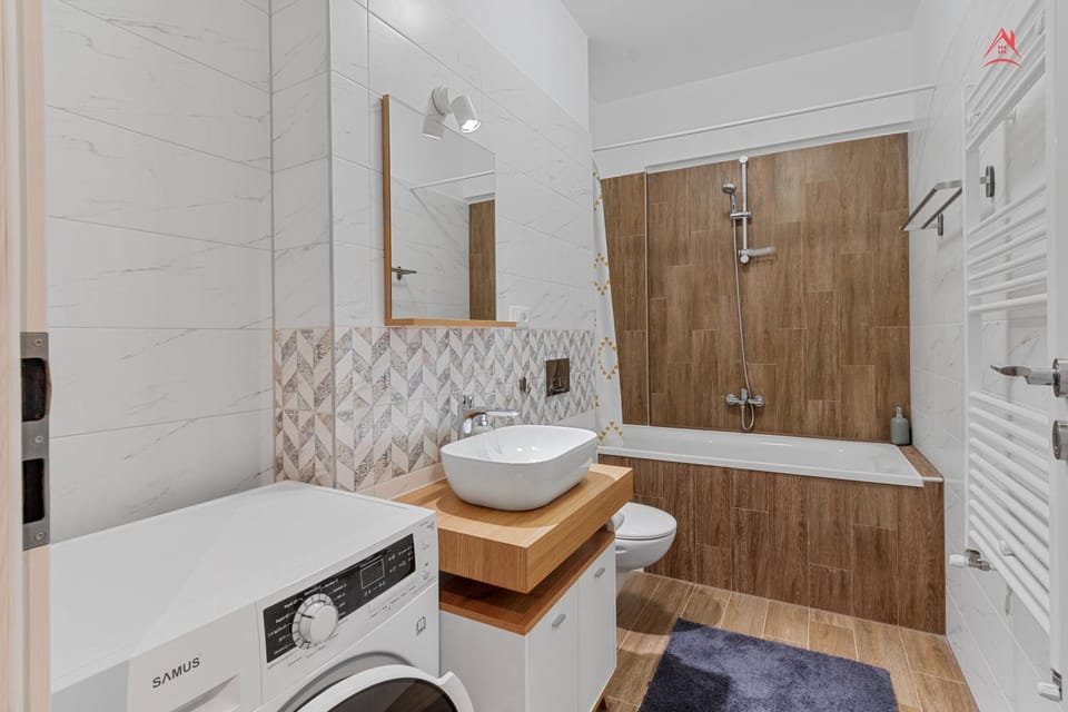 Shower, Toilet, Bathroom, towels, washing machine, dryer