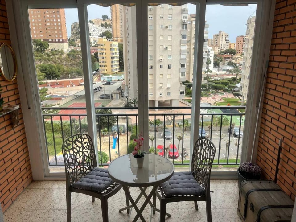 View (from property/room), Balcony/Terrace, Seating area, City view