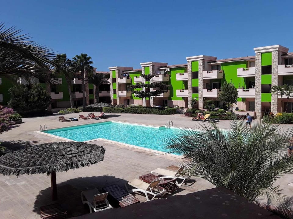 Property building, Patio, Garden, Pool view, sunbed