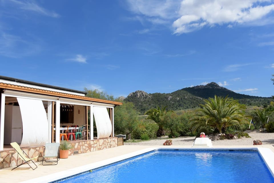 Property building, Patio, Spring, Day, Natural landscape, Mountain view, Pool view, Swimming pool, Swimming pool, sunbed