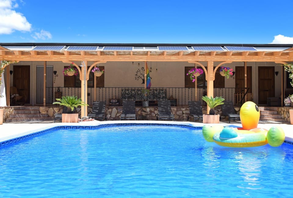 Property building, Patio, Day, Pool view, Swimming pool, Swimming pool, sunbed
