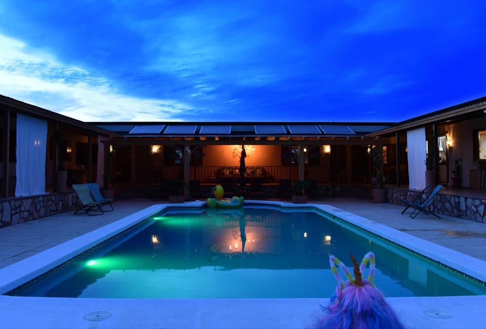 Property building, Night, Pool view, Swimming pool, Swimming pool, sunbed