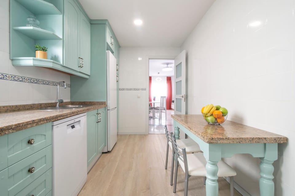 Kitchen or kitchenette, dishwasher, microwave, oven, stove, wardrobe, kitchen