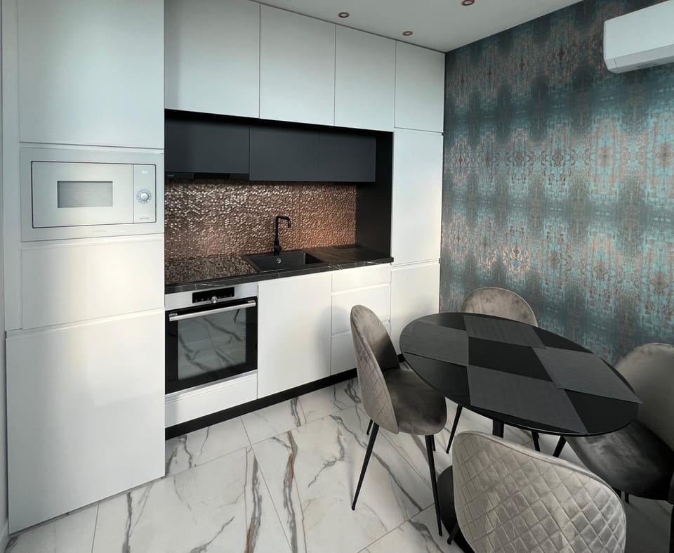 Kitchen or kitchenette, Seating area, Dining area, minibar, pet friendly, air conditioner