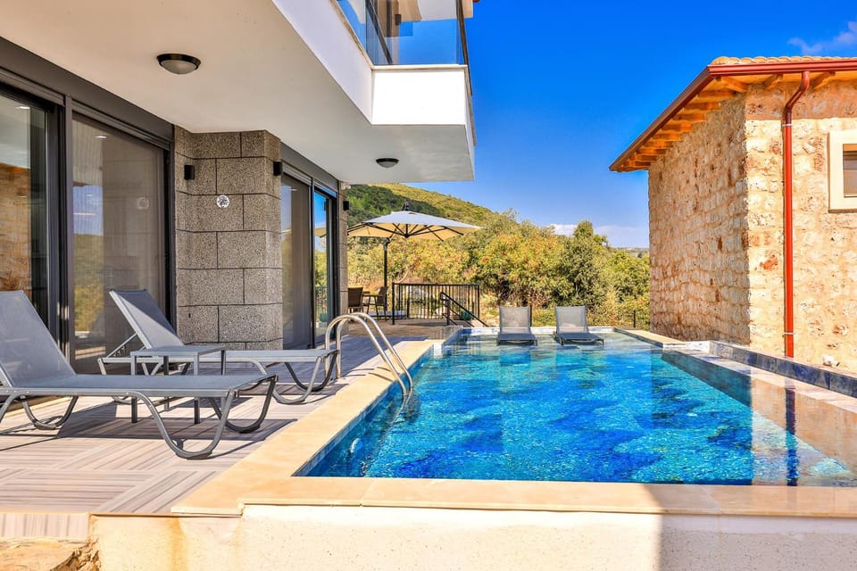 Patio, Day, Pool view, sunbed
