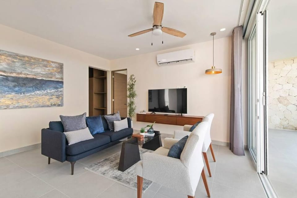 TV and multimedia, Living room, Seating area, fireplace, air conditioner