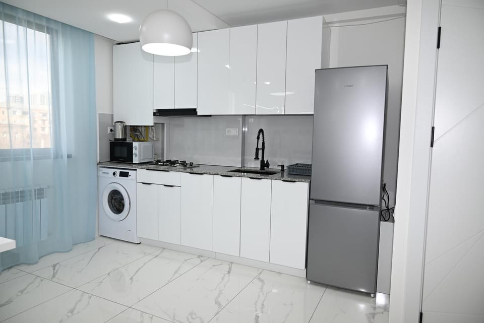Coffee/tea facilities, Kitchen or kitchenette, minibar, stove, washing machine