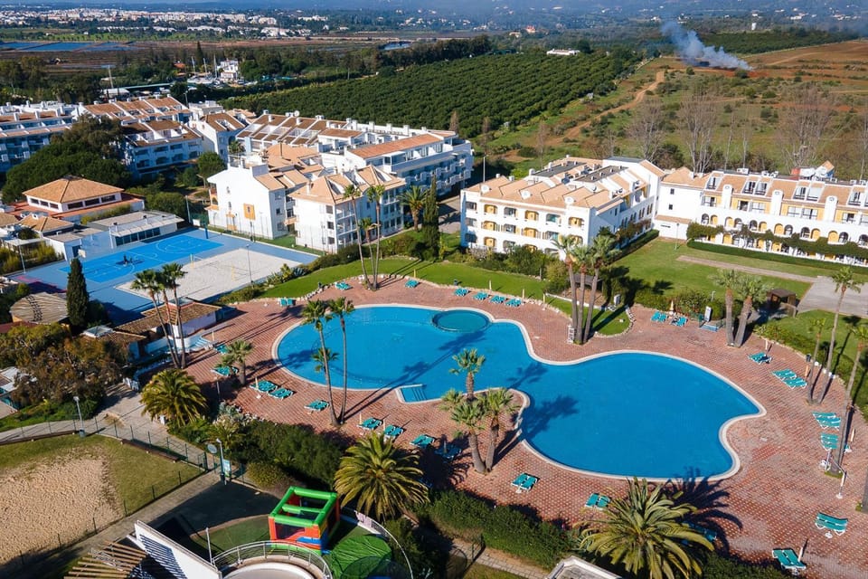 Property building, Natural landscape, Bird's eye view, City view, Swimming pool, Location