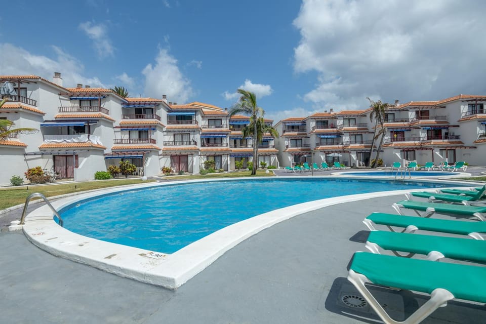 Property building, Living room, Swimming pool