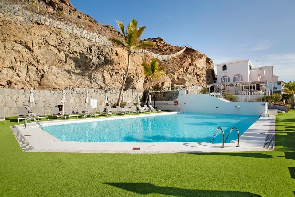 Property building, Living room, Swimming pool